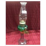 Oil lamp with clear base with green and gold Oil lamp with clear base with green and gold