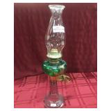 Oil lamp with clear base with green and gold