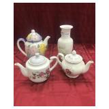 Three assorted tea pots, one vase made in Japan