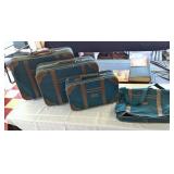 E. Boli Luggage Set - Tuesday Morning
