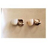 Two Sets of False Teeth Set in Gold