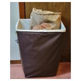 Canvas Laundry Basket Stuffed With Several Totes
