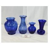 Mixed Styles Four Indigo Glass Vases