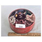 Red Tin Filled With Eight Men