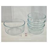 Four Pyrex Pale Blue Glass Bowls