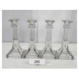 Four Matching Heavy Glass Candlesticks