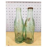 Two Vintage Coca~Cola Soda Bottles