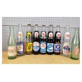 Total of 9 Royal Crown Cola Bottles