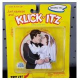 Klick-Itz Wedding Kiss Metal Click Toy