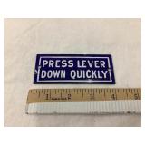 Porcelain Register Sign, "Press Lever Down