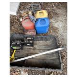 Gas cans, batteries, dolly,