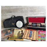 Records, eight tracks, practice drum pad, chair