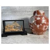 Diorama and urn