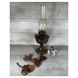 Oil lamp, tin lithograph wind-up toy featuring a