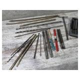 Plug taps, drill bits