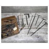 Tap wrenches, drill bits