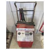 Snap on battery charger