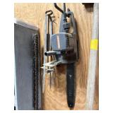 Corded chainsaw, mole trap, and saw blades