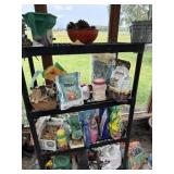 Shelf and contents of gardening supplies