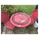 Cast table and chairs