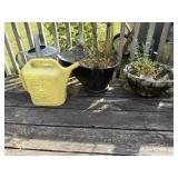 Two planters and two waters
