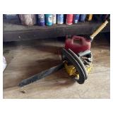 Chainsaw and gas can
