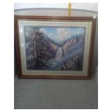 Framed water fall landscape artwork in wooden fram