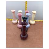 Eight plastic vases
