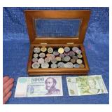 Foreign currency in wood display box