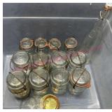 (12) Clear jars w/ glass lids & glass bottle