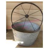 Old 20in washtub & iron plow wheel (patio)