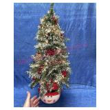 Lighted 25in Christmas tree in snowman holder