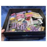Black box w/ scrapbook materials (stickers)