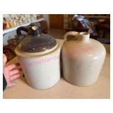 (G) 2 Stoneware Jugs w/Handles (damaged)