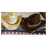 Two Cowboy Hats and Western Style Blanket