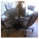 Glass Top Pedestal Table with Four Chairs