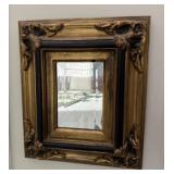 Ornate Black and Gold Mirror