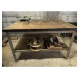 Work Table With Vise, Wood Pieces and Wire