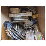 Assortment of Baking Pans and Kitchen Essentials