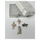 Four Sterling Charms