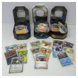 Three Tins of Pokemon Cards