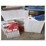 Twenty Four Air Filters of Various Sizes