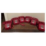 Six Vintage Red Telephones