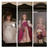 Three Display Cases and Collectible Dolls