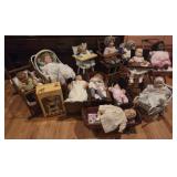 Collection of Porcelain Dolls, Cradles and More