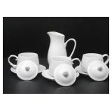 LIDDED TEA CUPS, SAUCERS, AND CREAMER