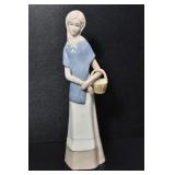 PORCELAIN LADY W/ A BASKET FIGURINE