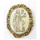 WHITE CARVED STONE BROOCH