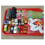 Gunsmoke Trails, Assorted Hot Wheels, and Toys
