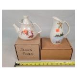 2- Red Wing Commemorative Pitchers